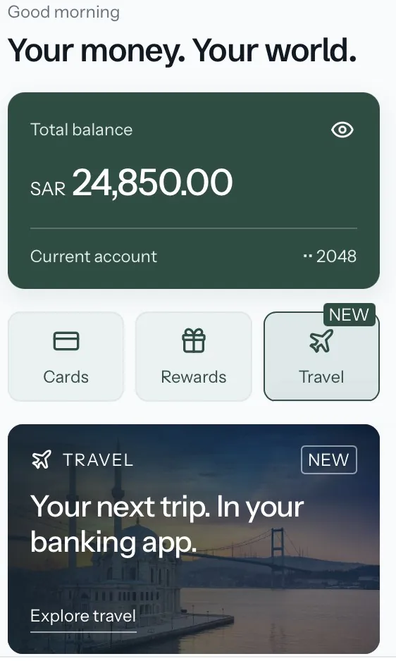 A banking app home screen with a new Travel tile and a Your next trip banner
